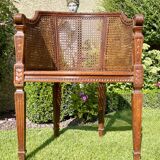 Fauteuil en bois fruitier et cannage style Louis XVl