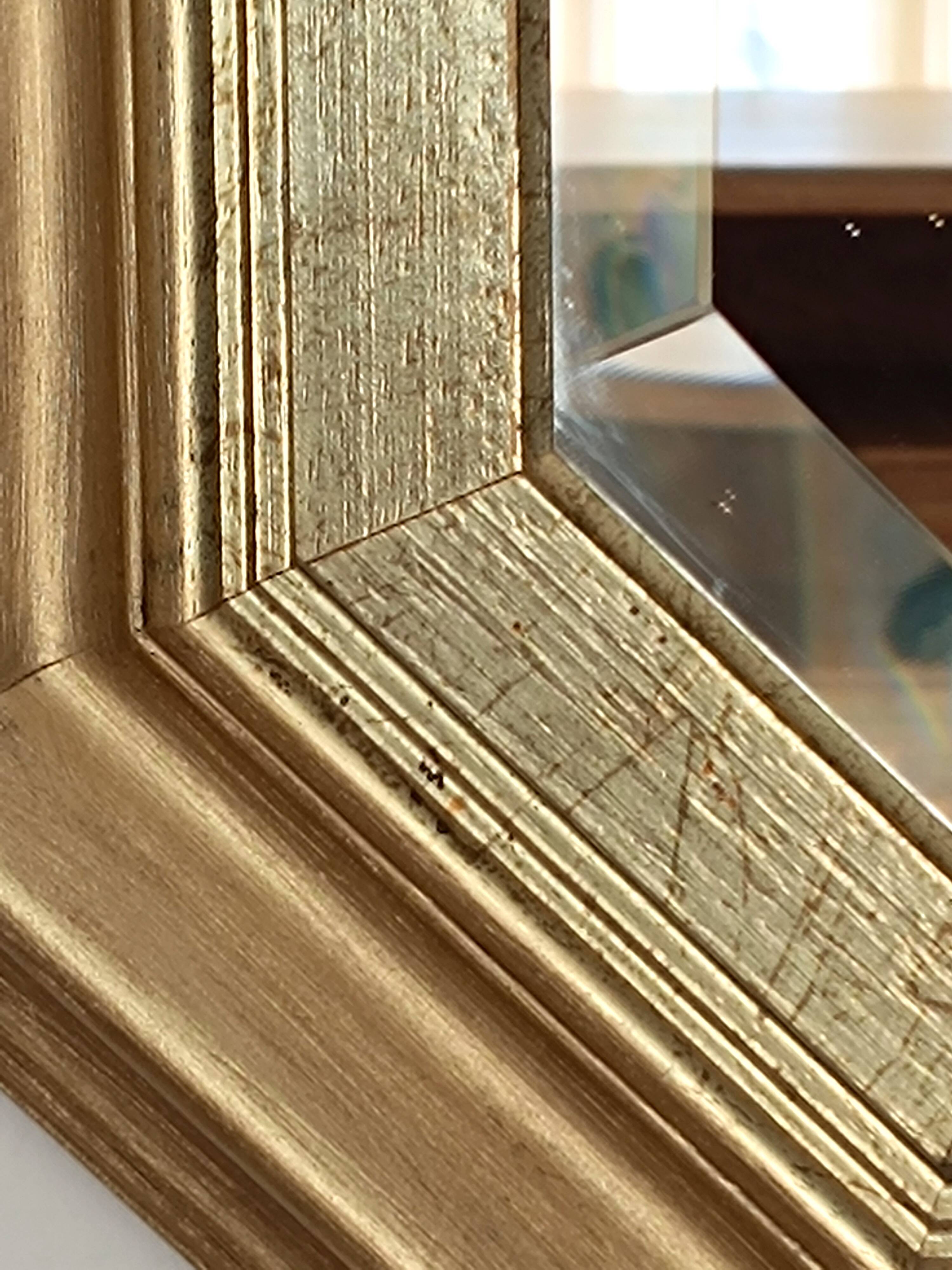 Octagonal gilded wooden mirror