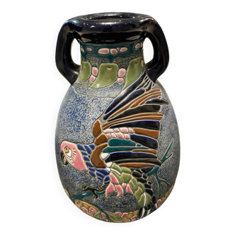 Large relief vase with parrot design
