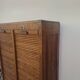 Antique 1950s double sliding door filing cabinet with curtains