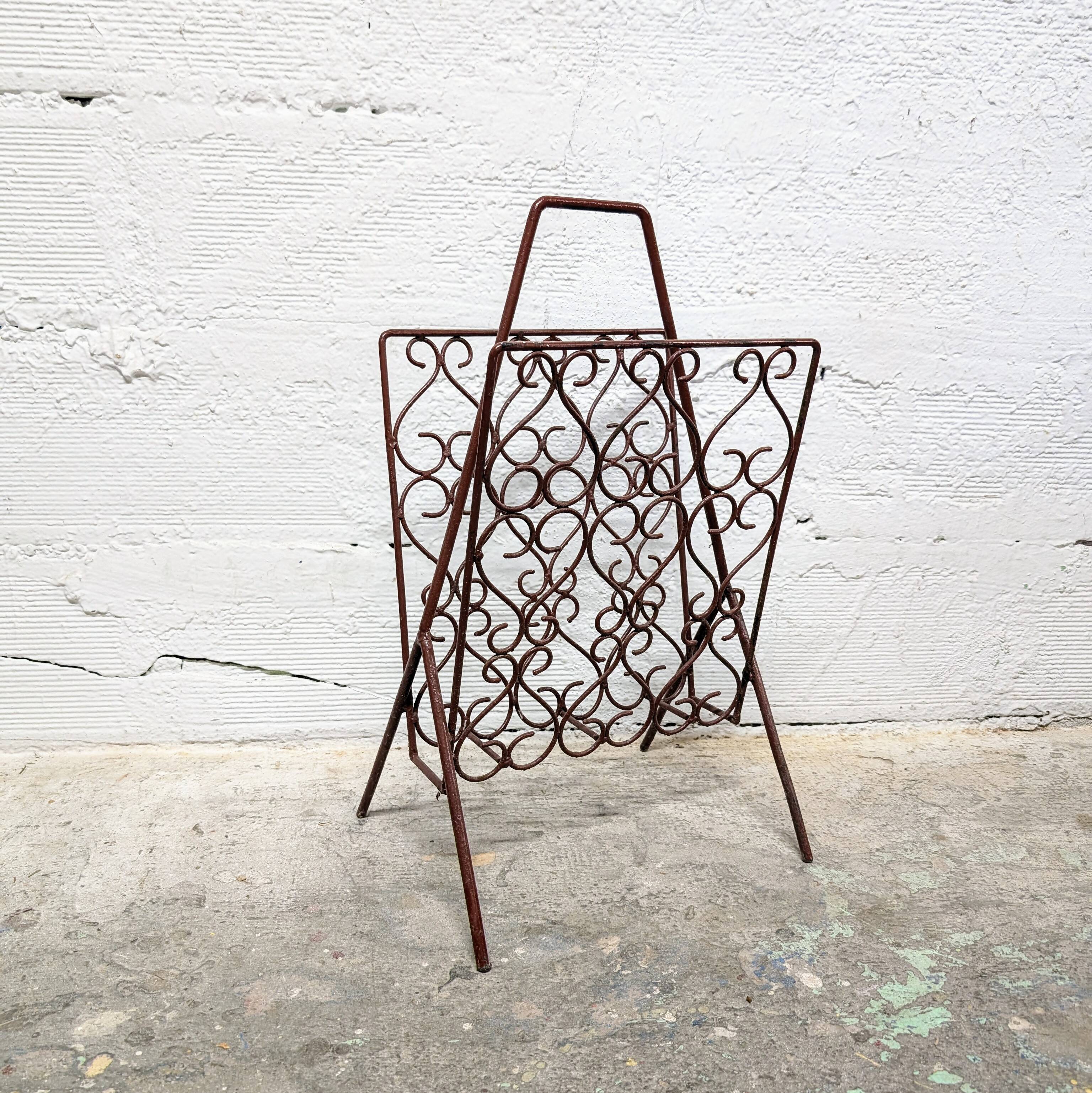 Vintage wrought iron magazine rack