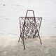 Vintage wrought iron magazine rack