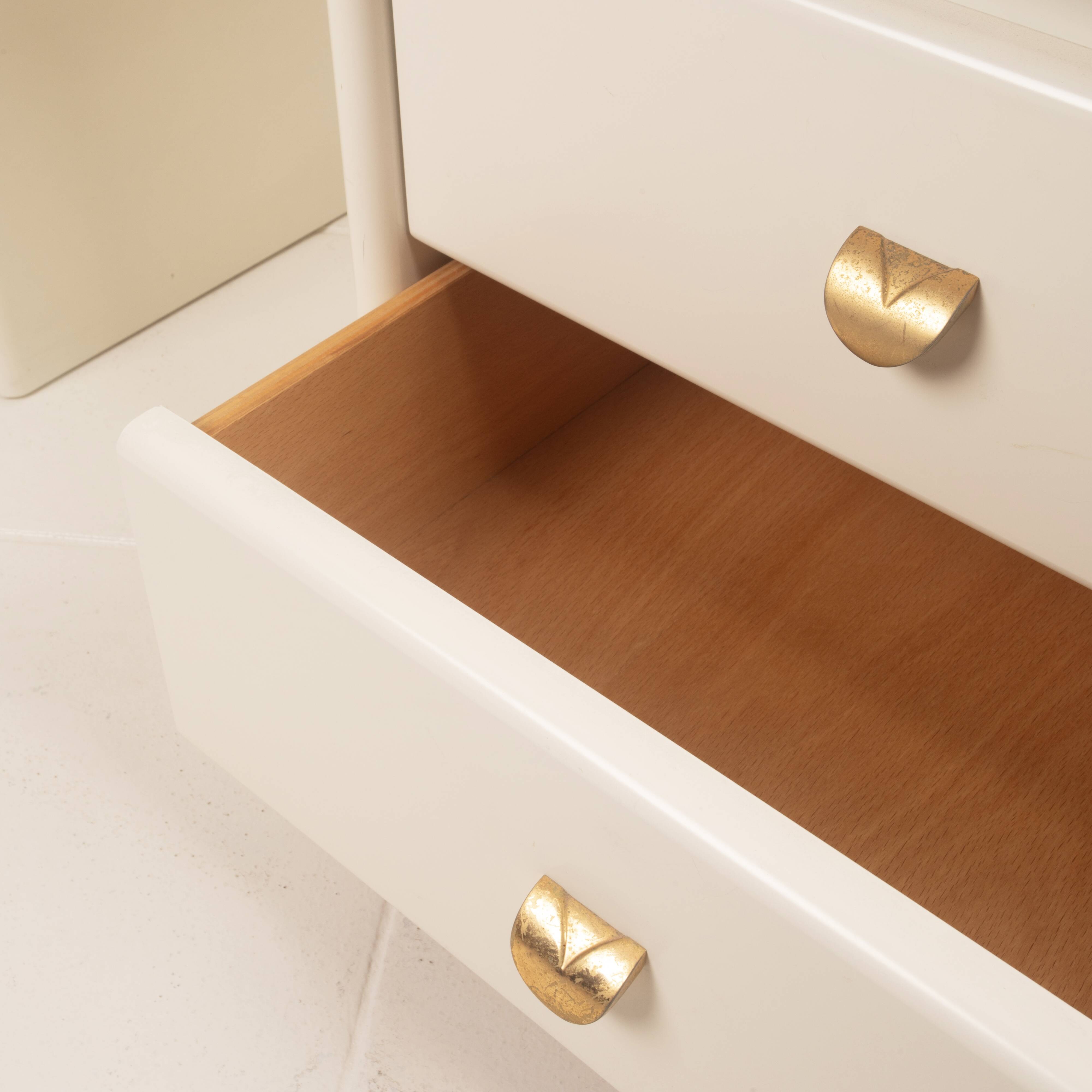 Pair of cream lacquered bedside tables by Pierre Cardin, 1980