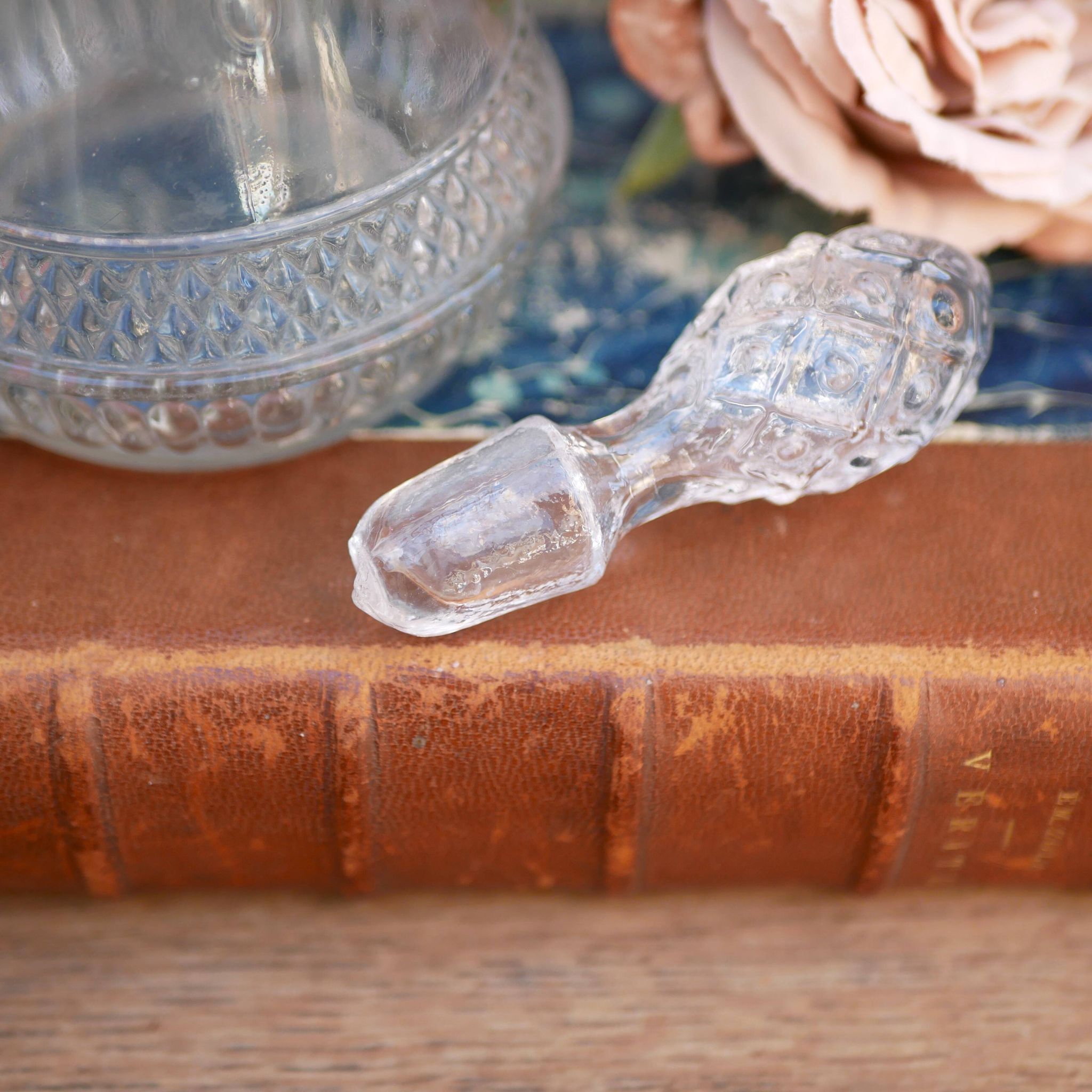 Cut glass liqueur decanter with decorated stopper