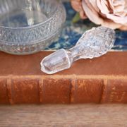 Cut glass liqueur decanter with decorated stopper