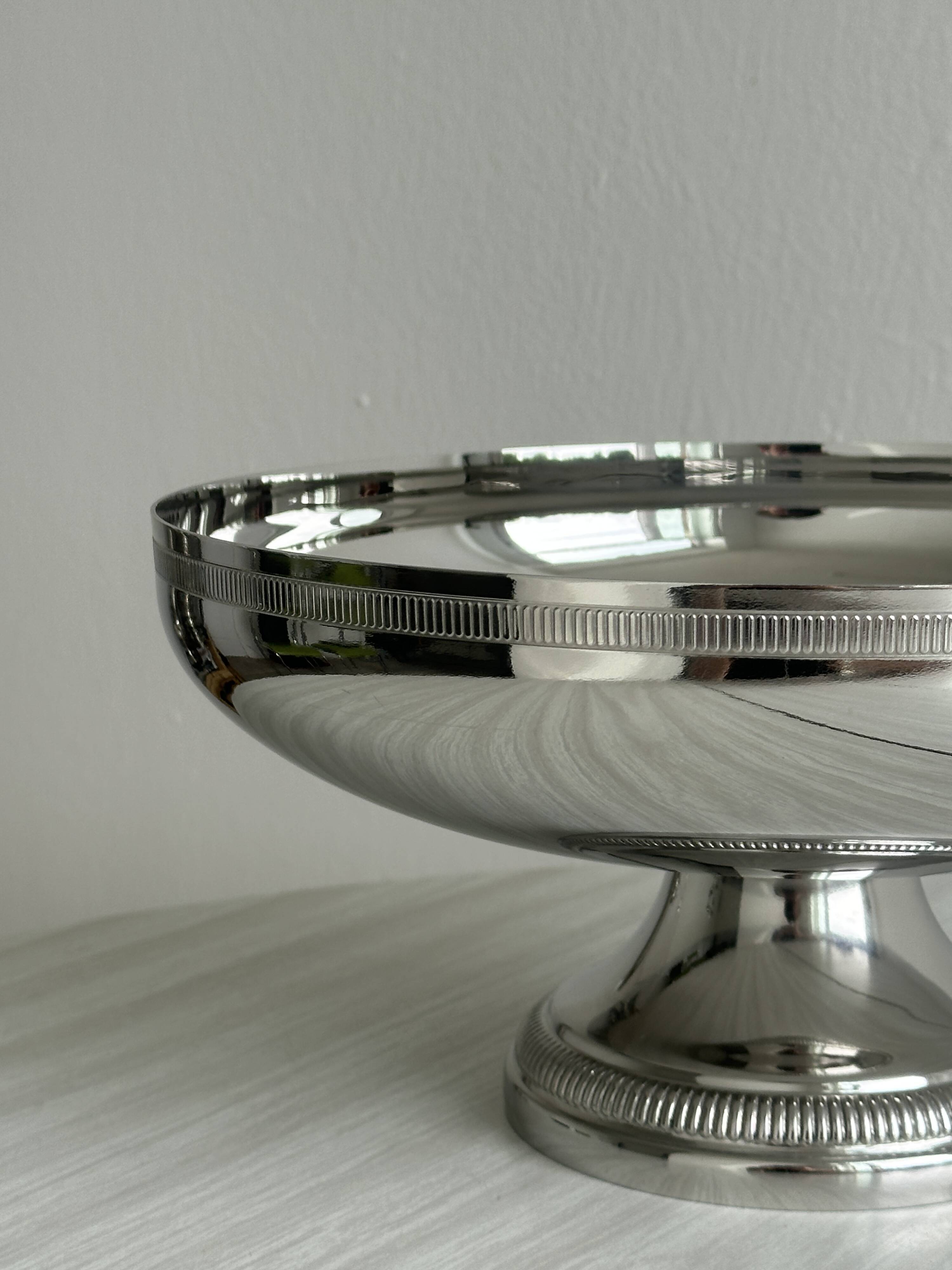 Large silver stainless steel pedestal bowl