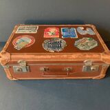 Old travel suitcase and legendary stickers, 1920