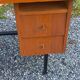 Vintage oak desk with a metallic base from the 1960s.