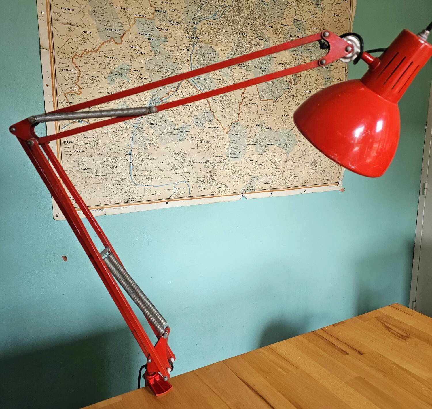 Red articulated workshop lamp