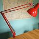 Red articulated workshop lamp