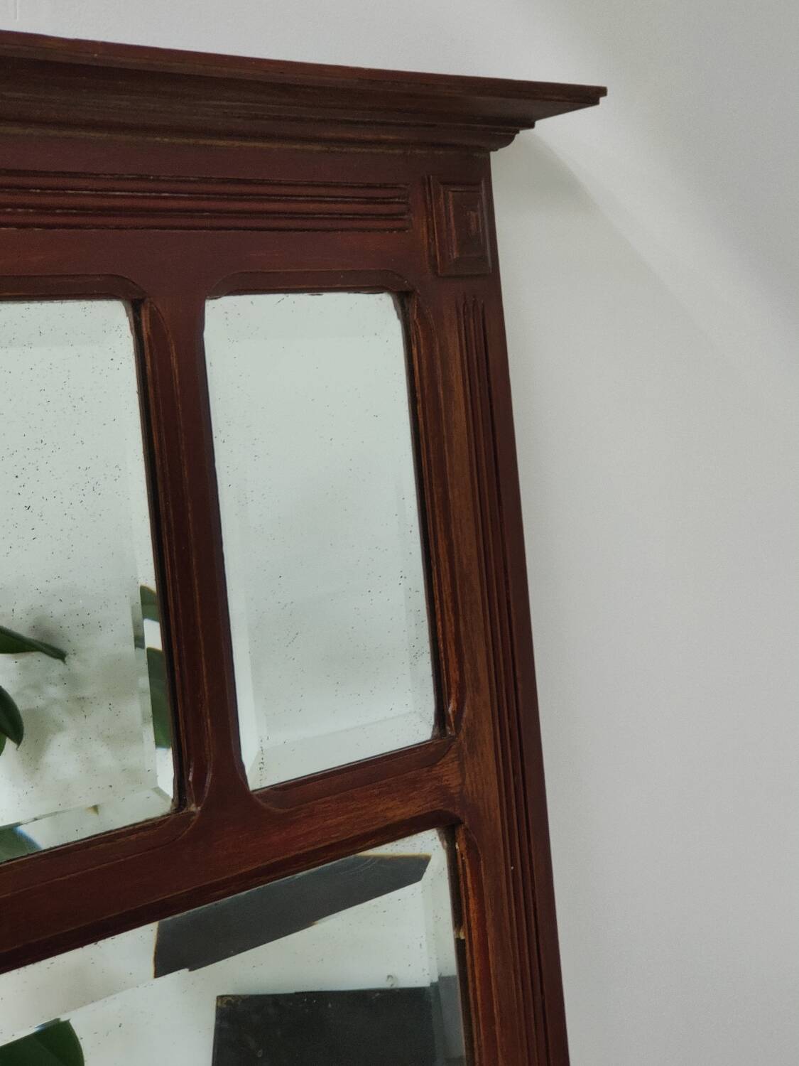 Antique beveled mirror on a wooden frame, 1930