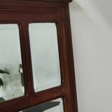 Antique beveled mirror on a wooden frame, 1930