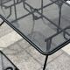 Set of 6 armchairs and perforated metal table from the 1950s.