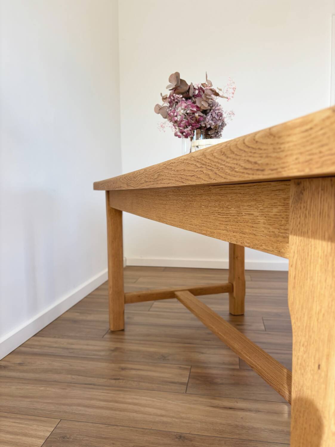 Solid oak farmhouse table with extensions.