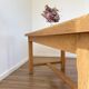 Solid oak farmhouse table with extensions.