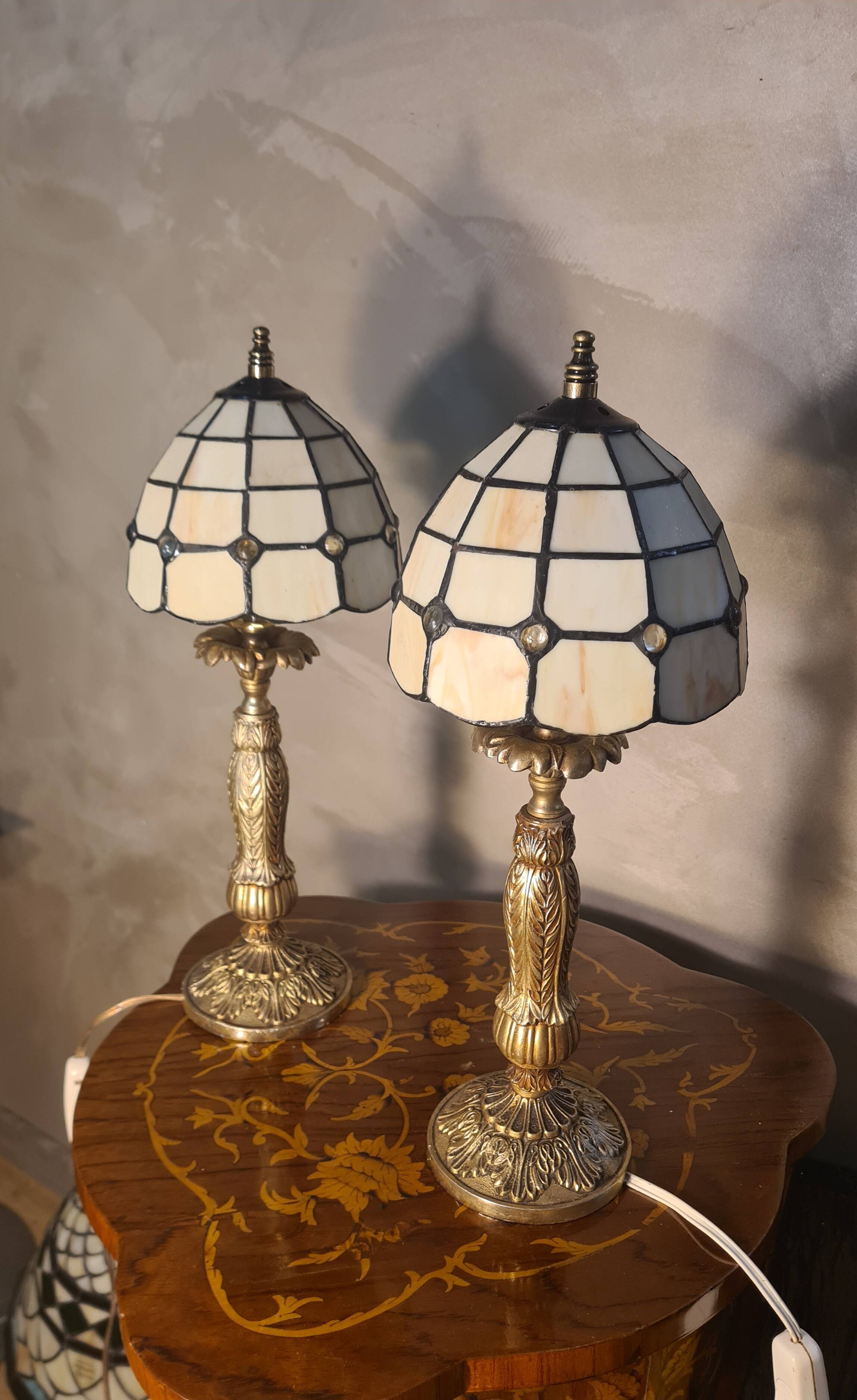 pair of bedside lamps in gilded bronze with glass shade