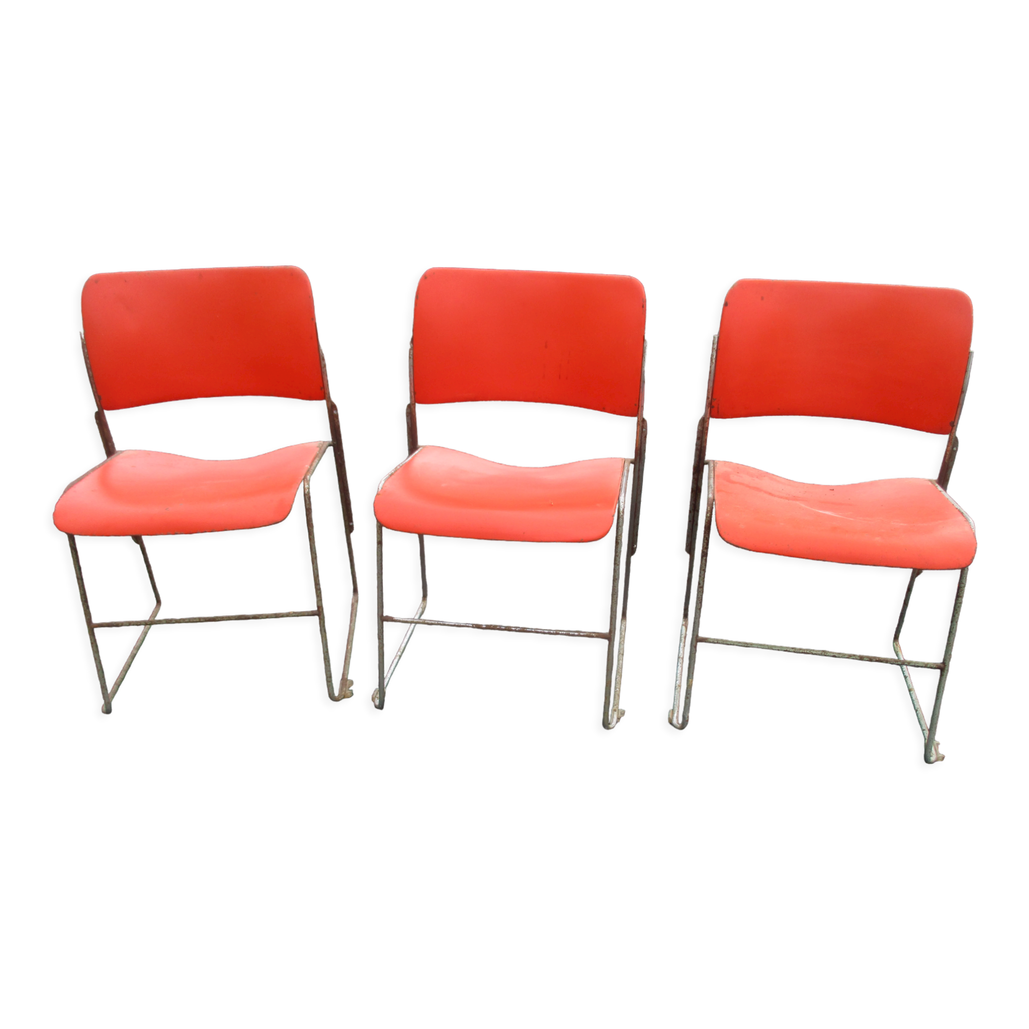 3 iron and plastic chairs