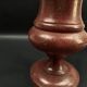 Lamp base in reconstituted stone, red "oxblood", 20th century