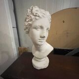Half 20th-century plaster bust of an antique woman.