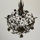 Patinated metal ceiling light with a floral and leaf pattern, 1950s, Italy.