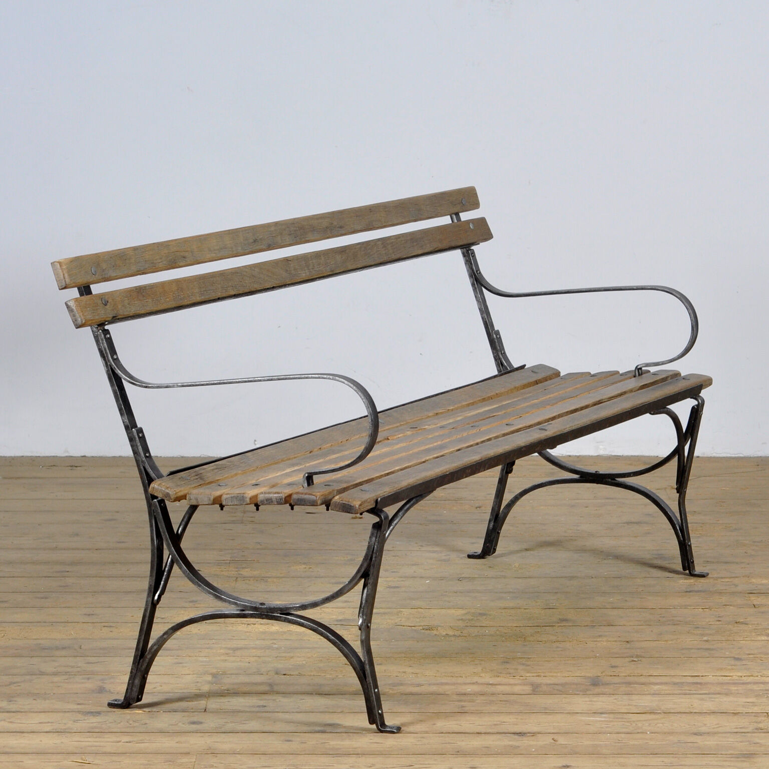 Riveted iron park bench 1920s