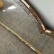 Large vintage brass and glazing bead mirror