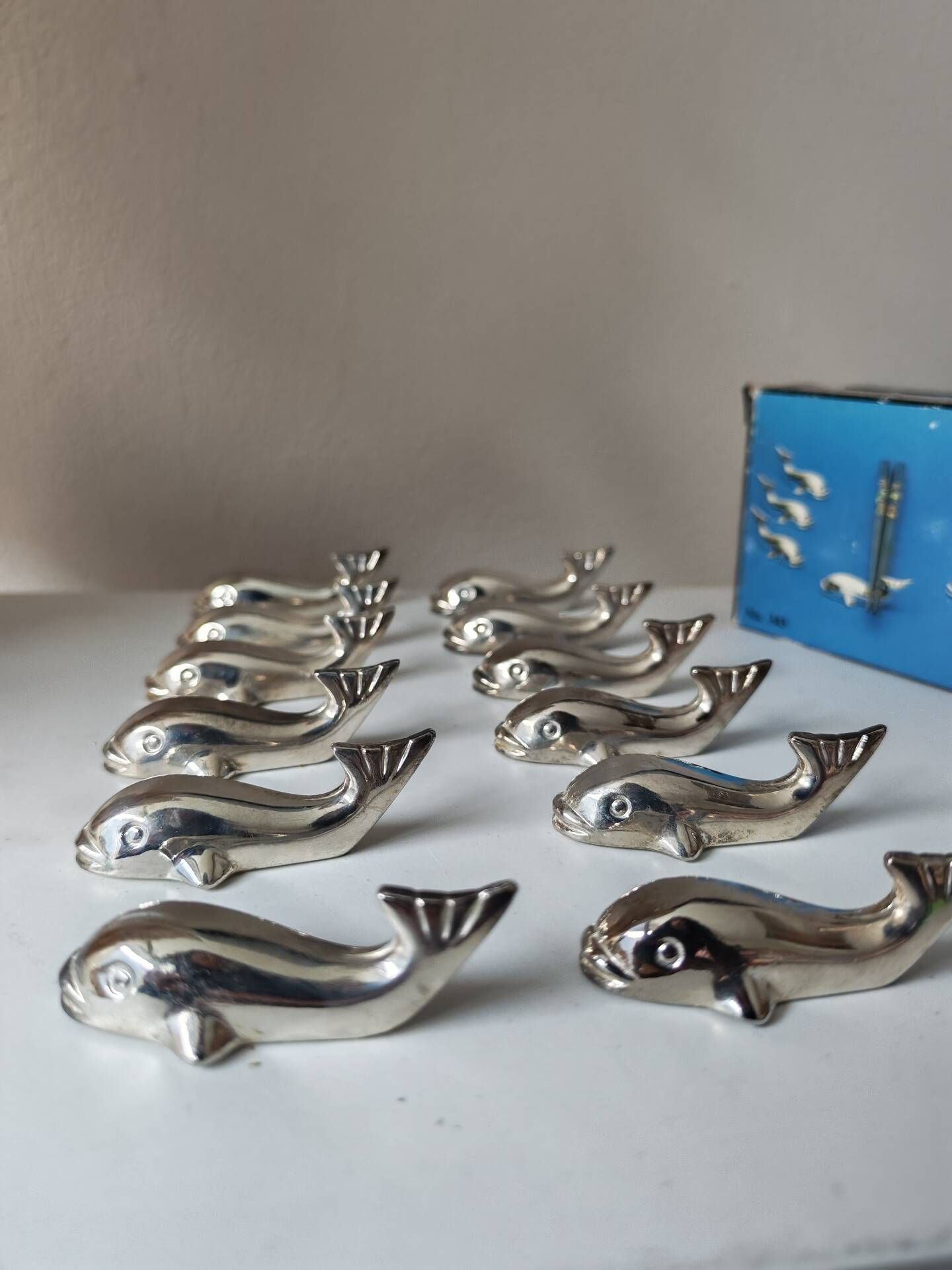12 silver metal whale knife rests