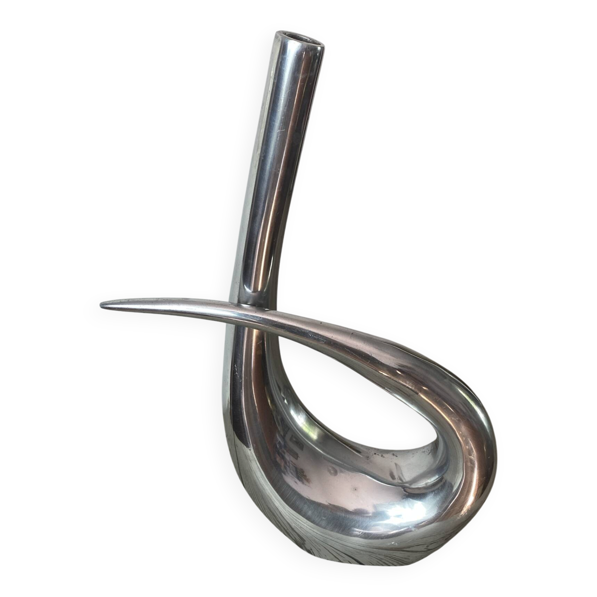 Sculptural vase design in polished aluminium.