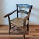 Vintage children's armchair in wood and straw, 50s