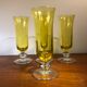 Large transparent yellow champagne flutes