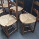 Six old straw chairs