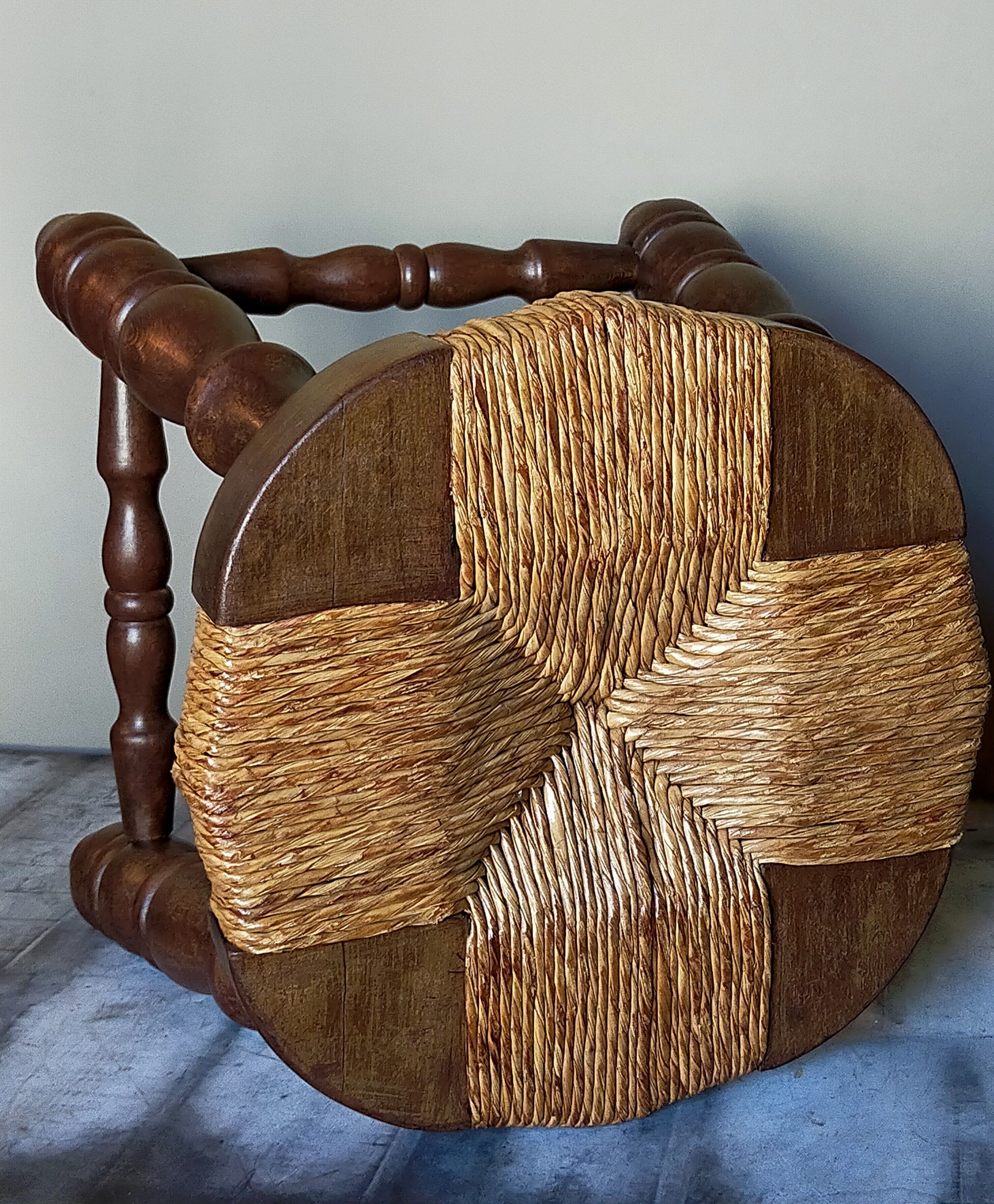 Low vintage regional stool in solid wood with straw top