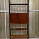 Italian footcase bookcase from the 60s in teak and metal