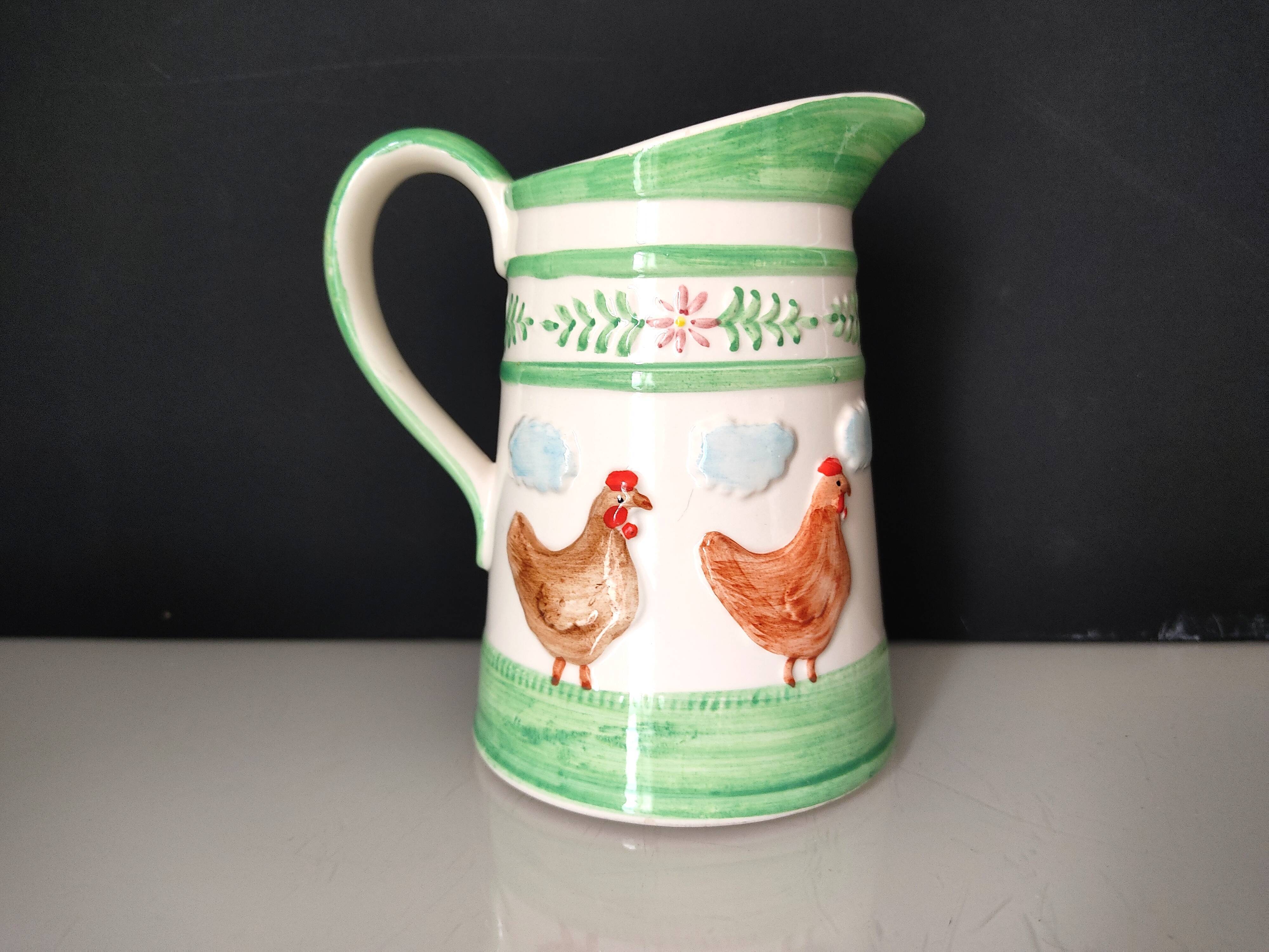 Andrea West rooster pitcher for Sigma