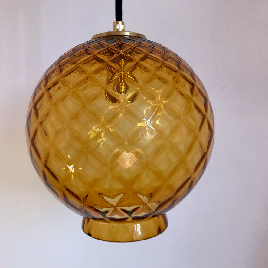 Amber glass globe suspension