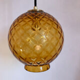 Amber glass globe suspension