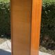 Meuble à rideau vintage en bois années 60-70