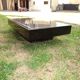 Table basse par Jean Claude Mahey laque et filet de laiton