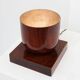 Lampe Art déco sculpturale en bois avec éclairage sur base carrée, vers 1920