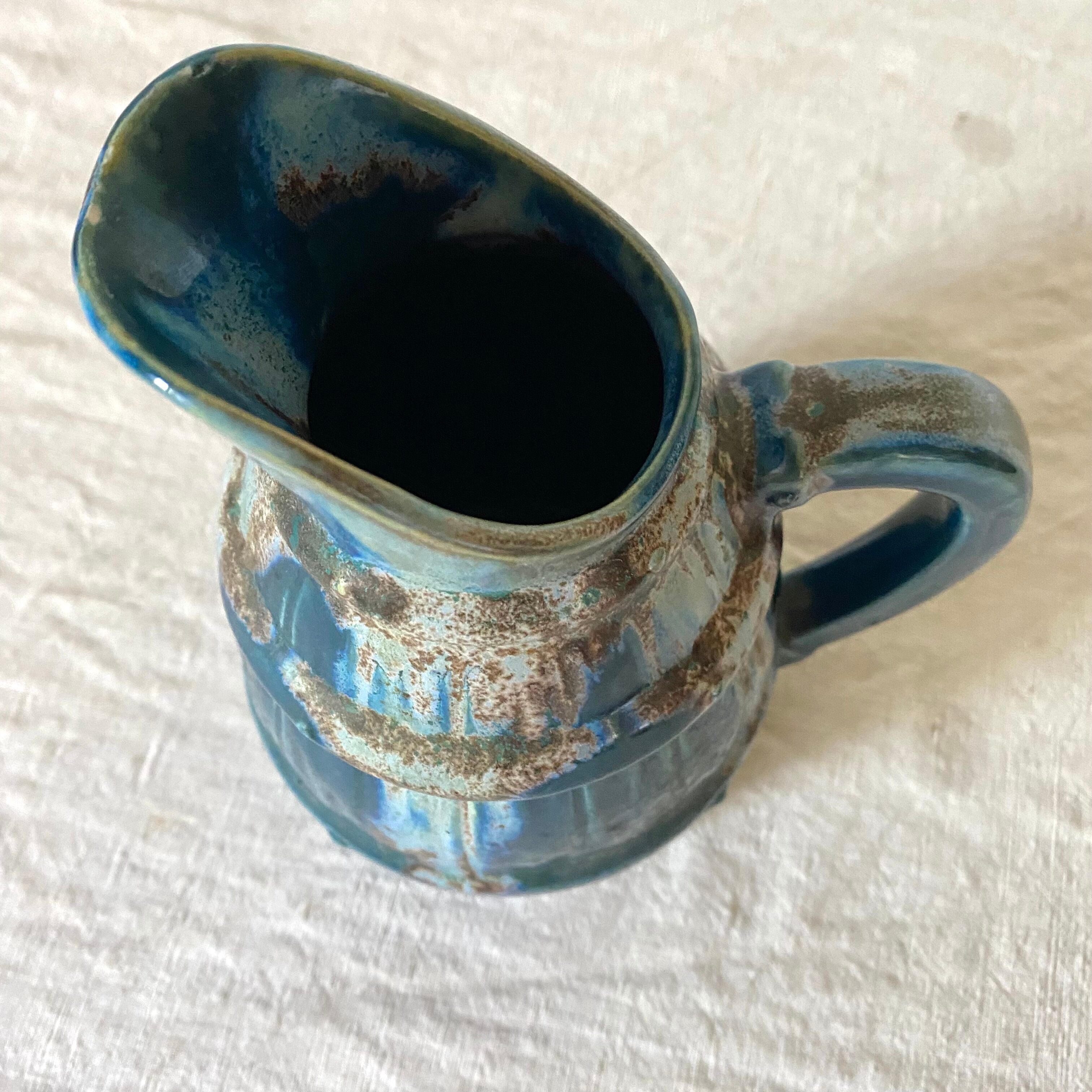 Blue barrel ceramic pitcher