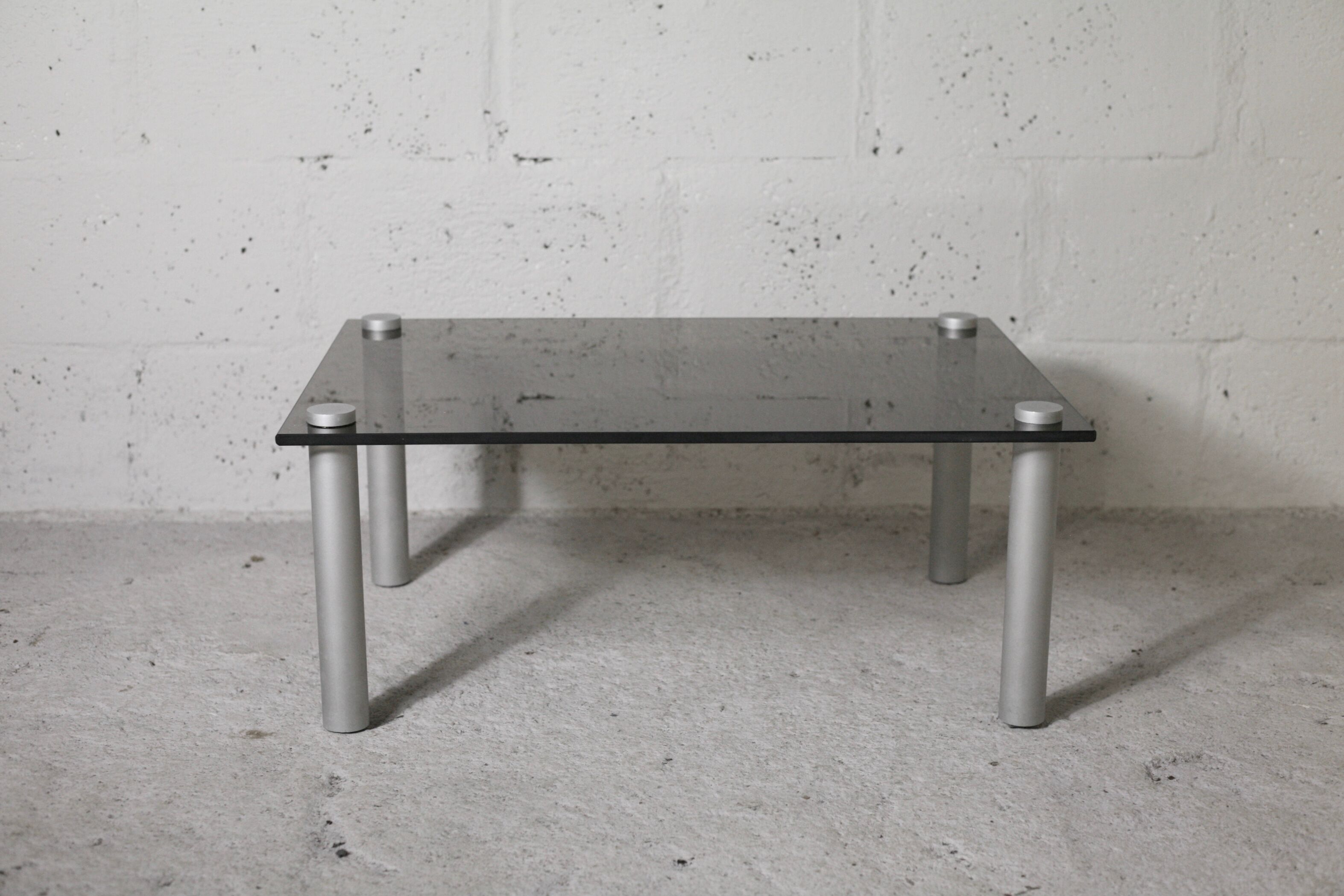 Coffee table cylindrical footings, tray smoked glass, circa 1970