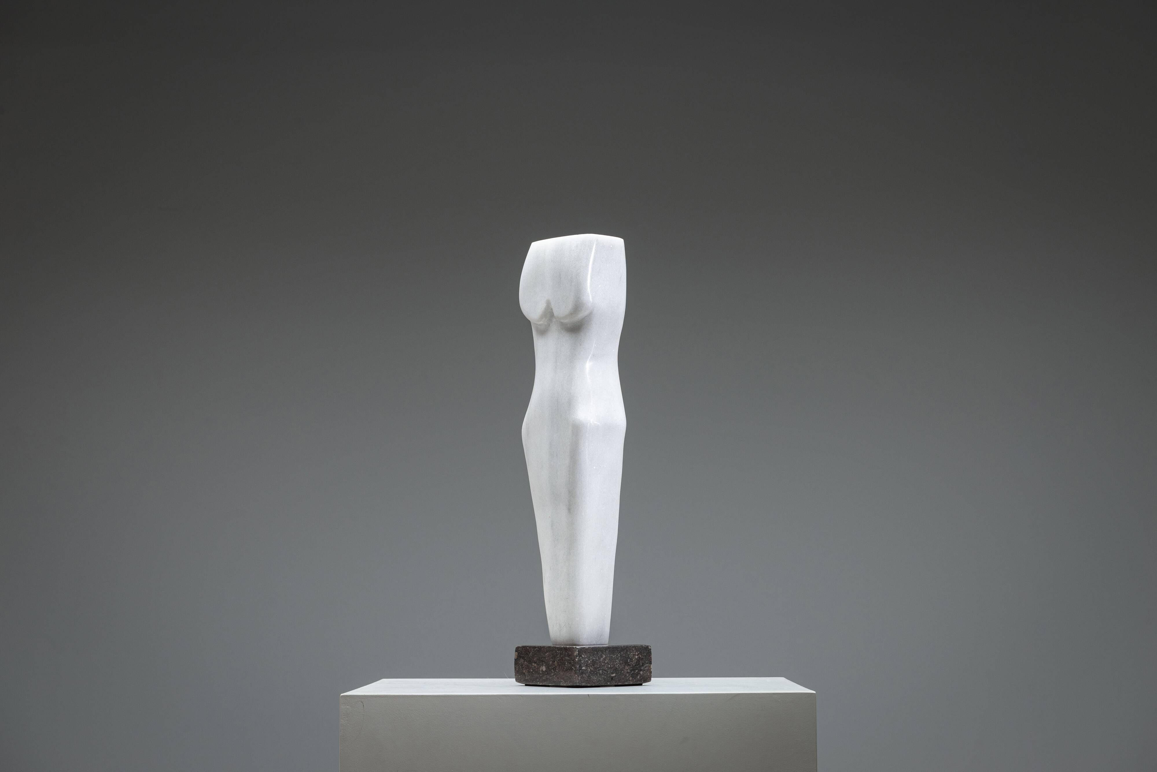 Abstract solid white marble torso