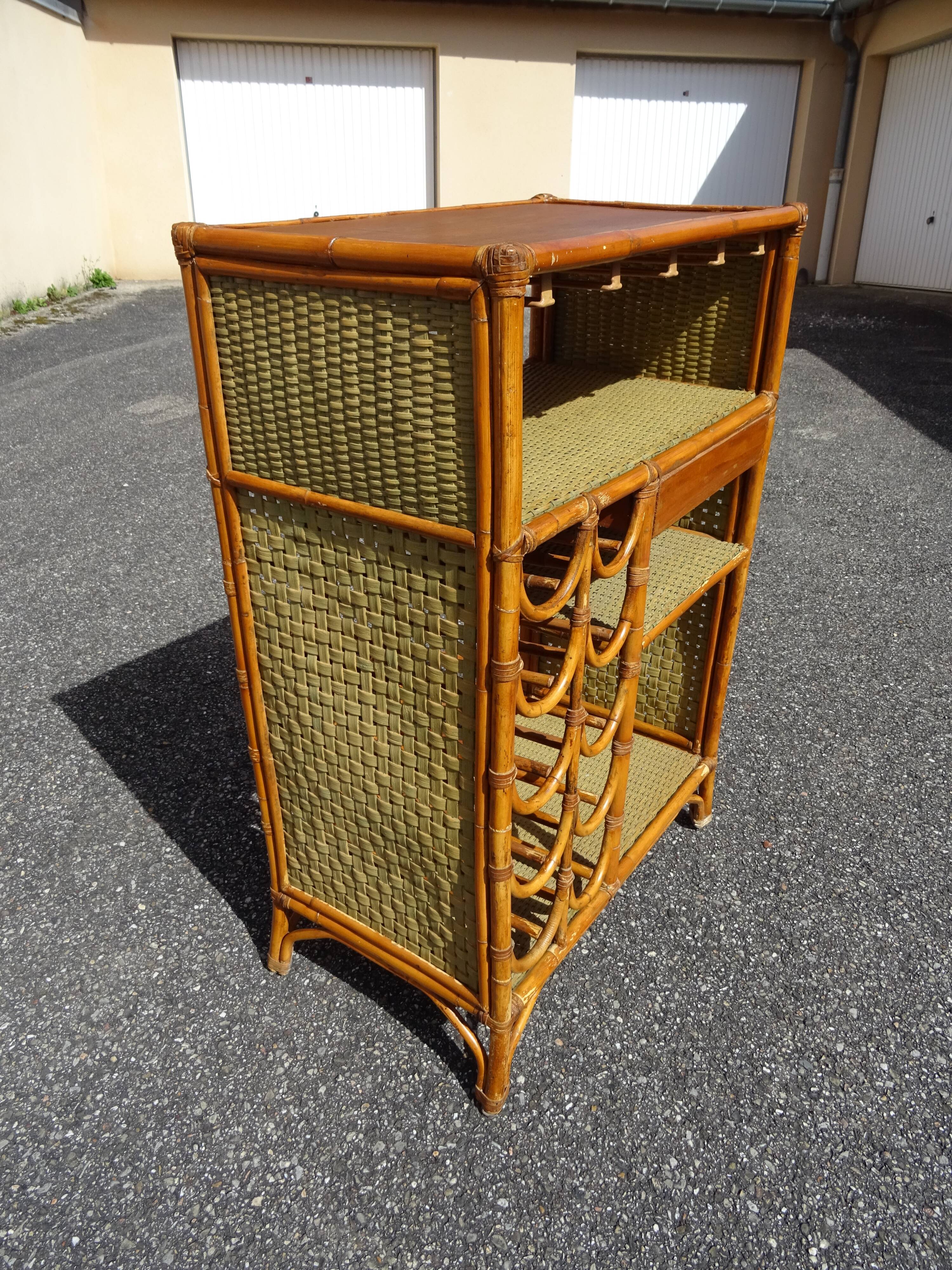 Vintage rattan bar cabinet from the 60s/70s