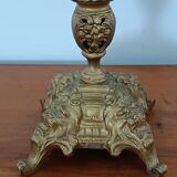 Bronze candlestick with lion head decoration
