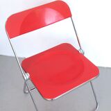 Red Plia chair Giancarlo Piretti Anonima Castelli