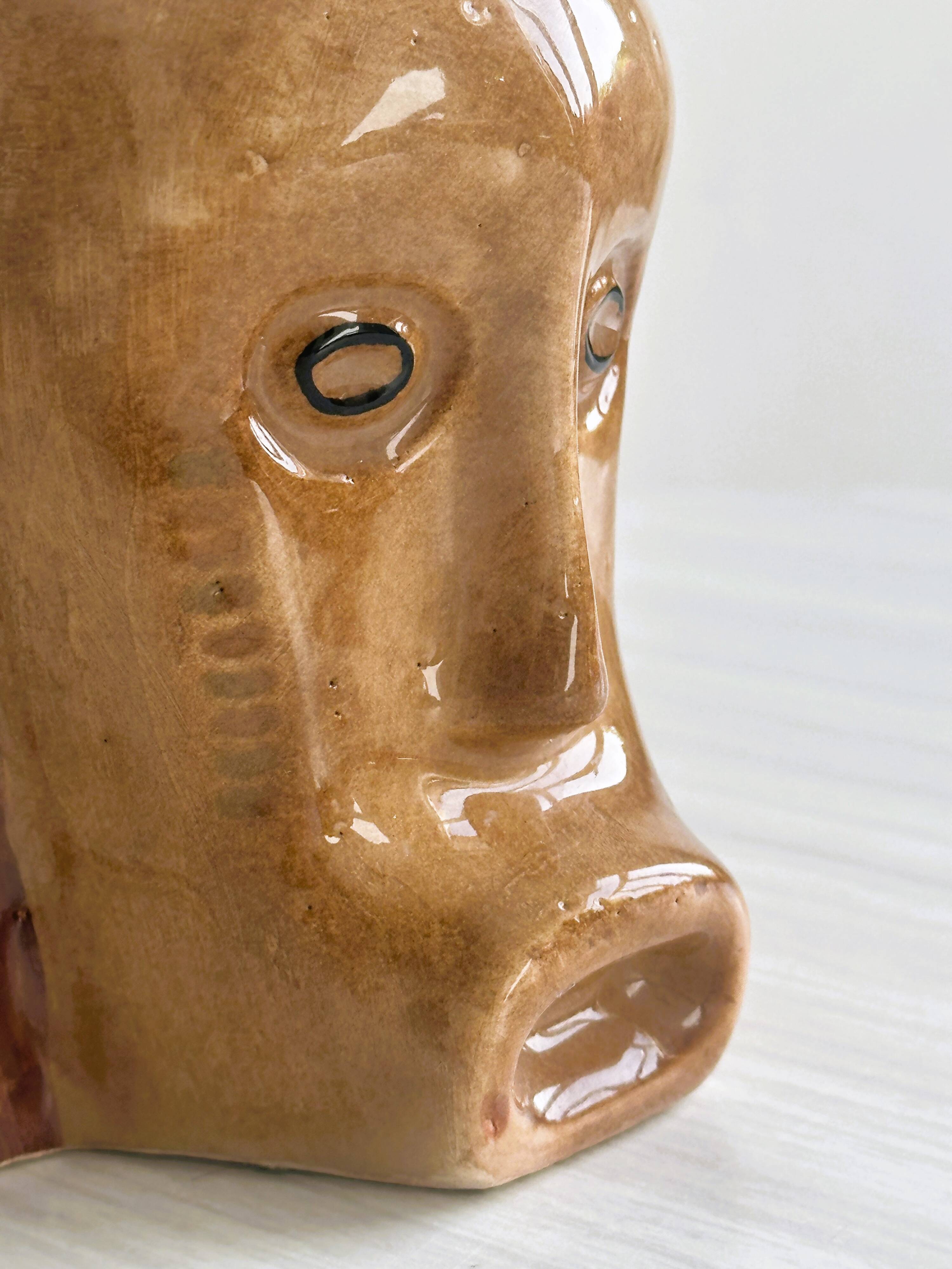Faces ceramic mug.