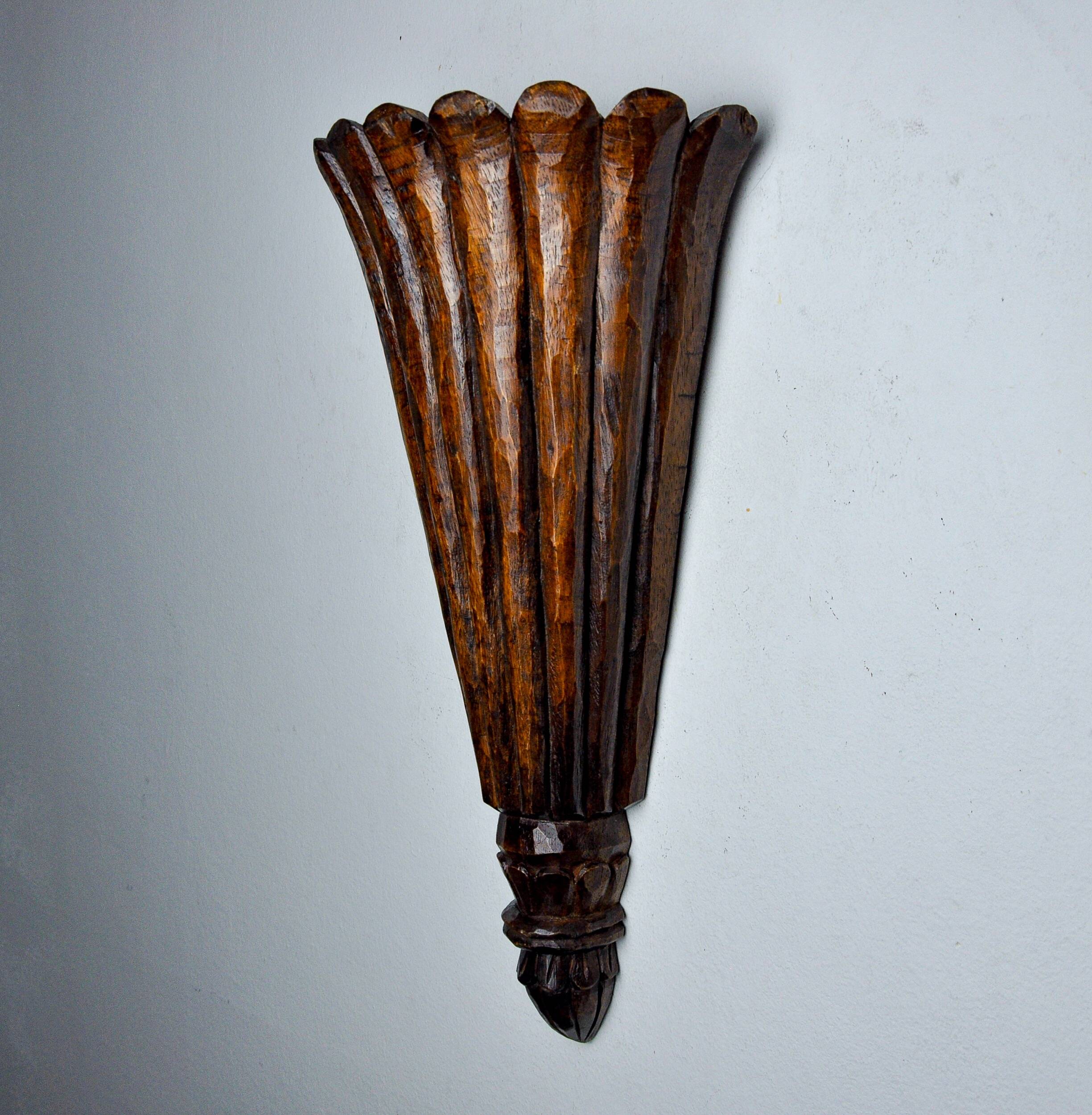 Art Deco wall light in carved wood, France, 1930