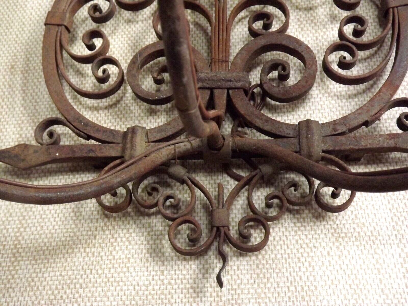French triple wall sconce in wrought iron, early 20th century.