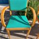 3 vintage bridge chairs with rounded armrests.