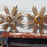 2 wooden sun mirrors and golden plaster